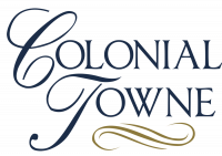 The words “Colonial Towne” in elegant script with a gold decorative swirl underneath.